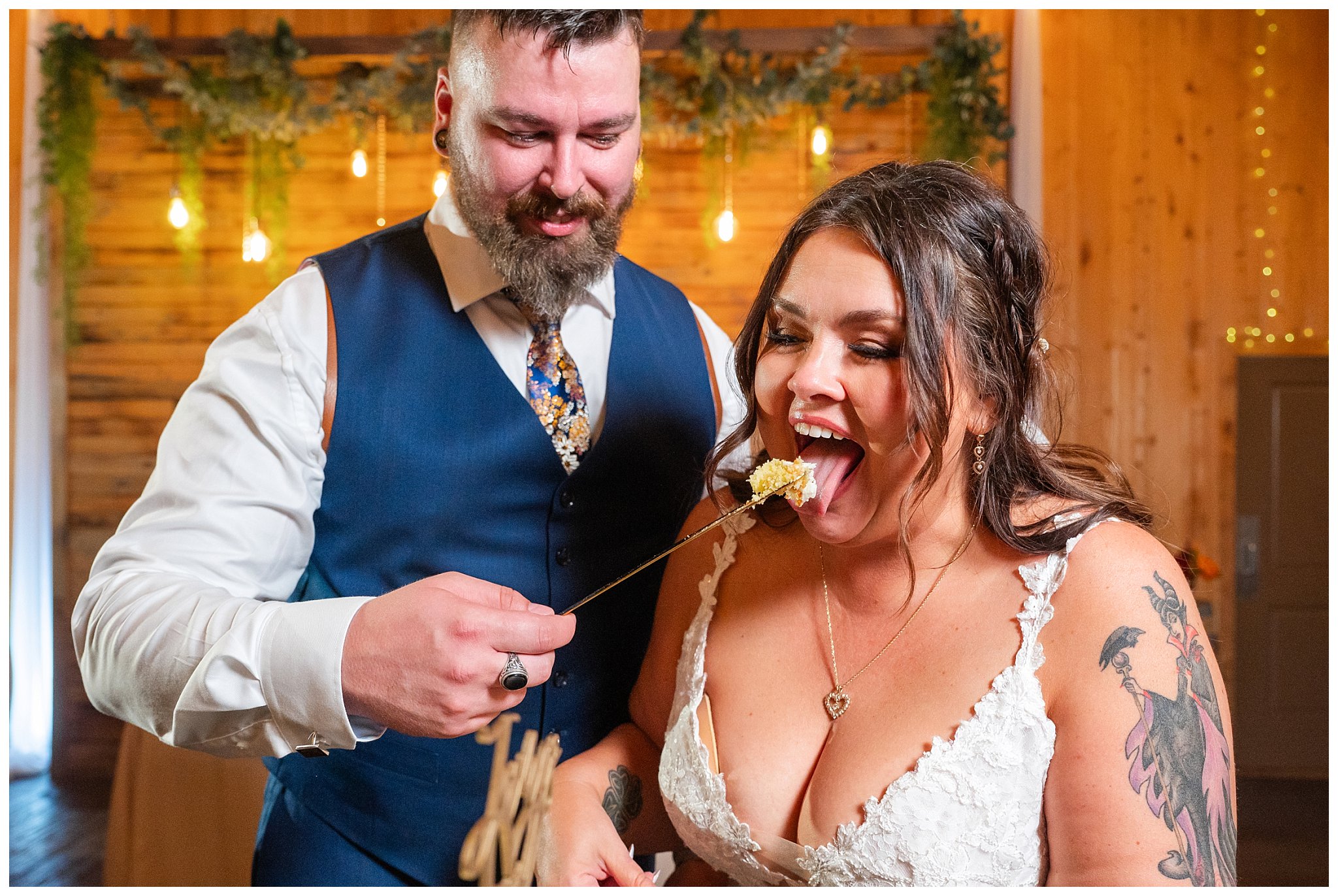 Cake cutting funny moments in the barn at Oak Hills | Star Wars Themed Wedding at Oak Hills Utah | Jessie and Dallin Photography