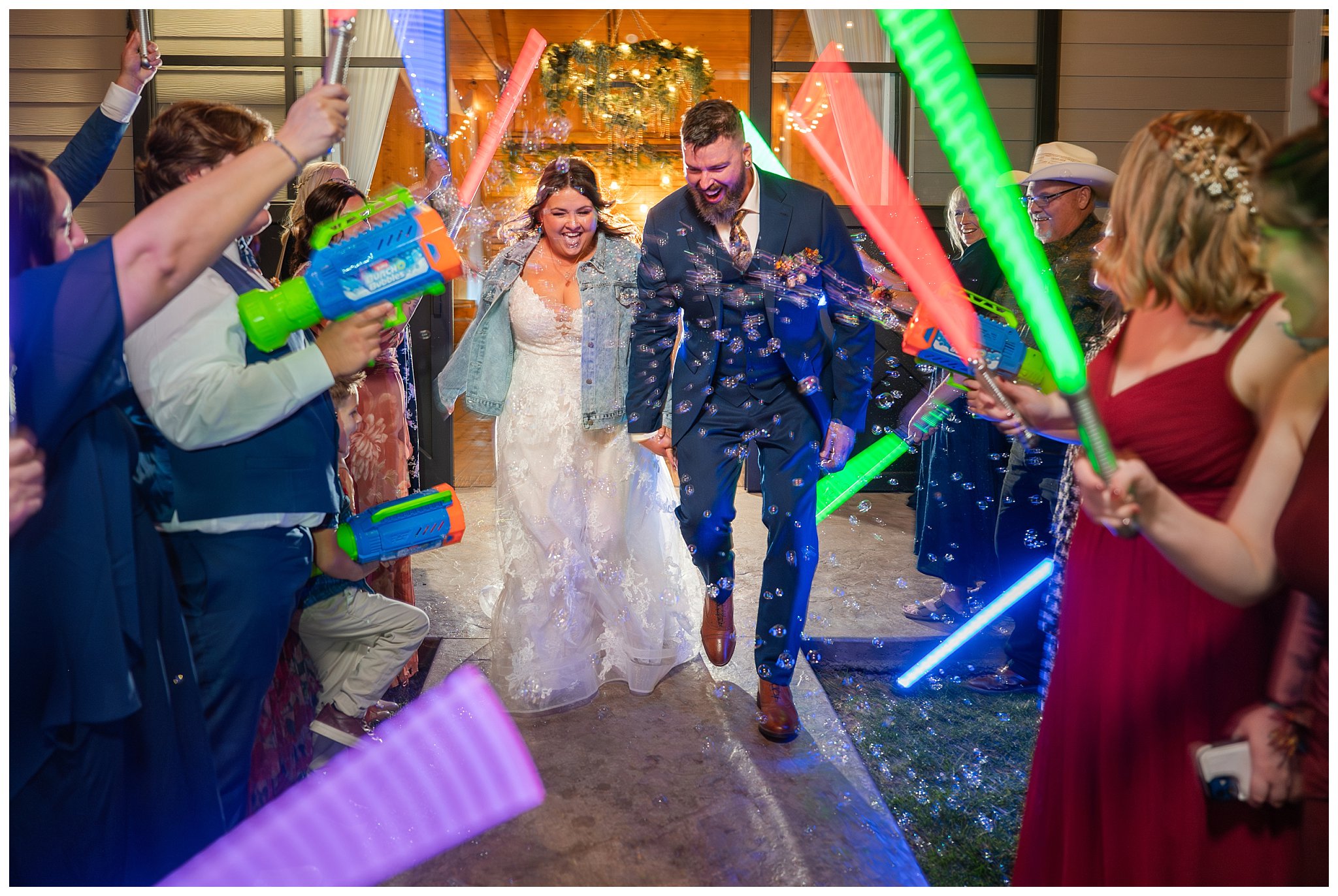 Lightsaber and bubble sendoff outside the barn at Oak Hills for the bride and groom | Star Wars Themed Wedding at Oak Hills Utah | Jessie and Dallin Photography