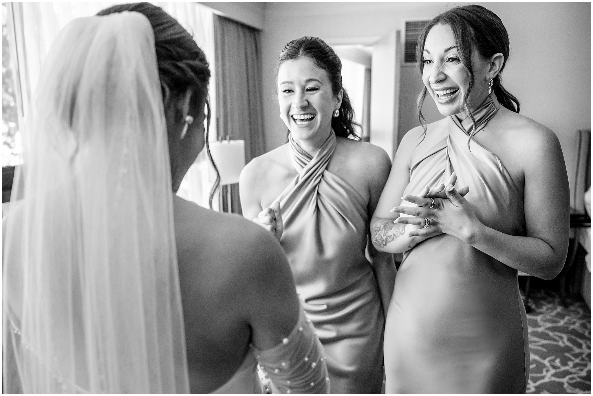 Bride and bridesmaids sharing a first look at The Cliff Lodge | Snowbird Summit Summer Wedding | Jessie and Dallin Photography