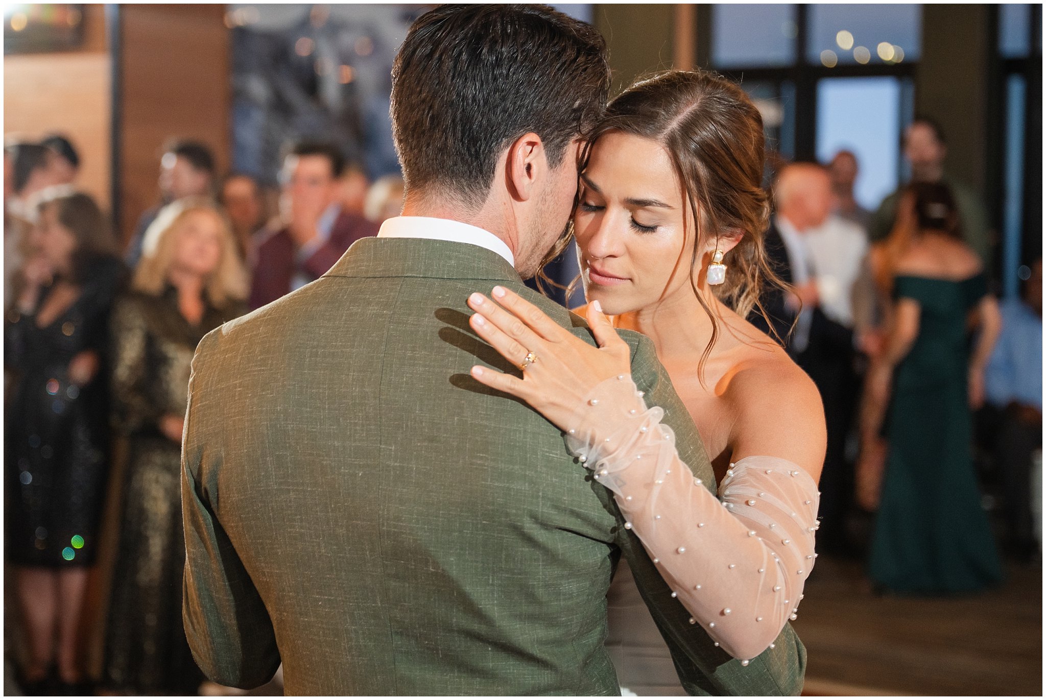 Bride and groom share an emotional first dance inside the lodge | Snowbird Summit Summer Wedding | Jessie and Dallin Photography